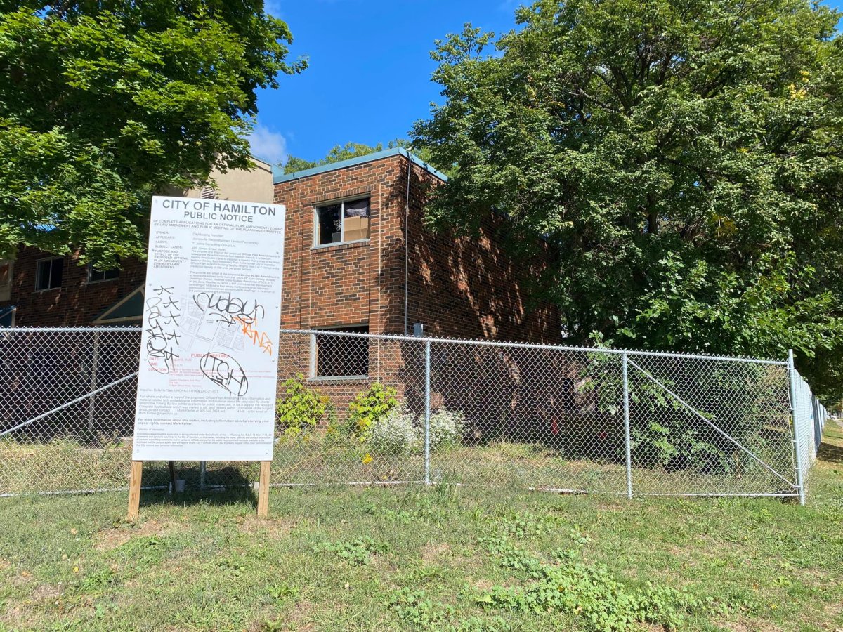 A photo of old townhomes set to be demolished in Hamilton's Jamestown neighbourhood to make way for a mixed housing development. CN Railway has filed an appeal over the project over issues related to the proximity to its rail yards.