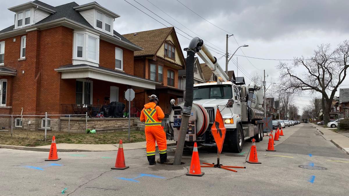 Work crews on scene at Rutherford & Myrtle Avenues in Hamilton fixing an improper sewer connection that's caused sewage to leak into Hamilton Harbour for the past 26 years.