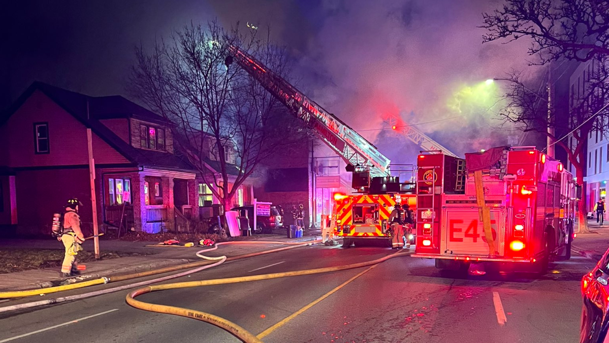 Firefighters battle a multiple alarm blaze at 45 Ottawa Street North in Hamilton Ont. on Jan 11, 2023.