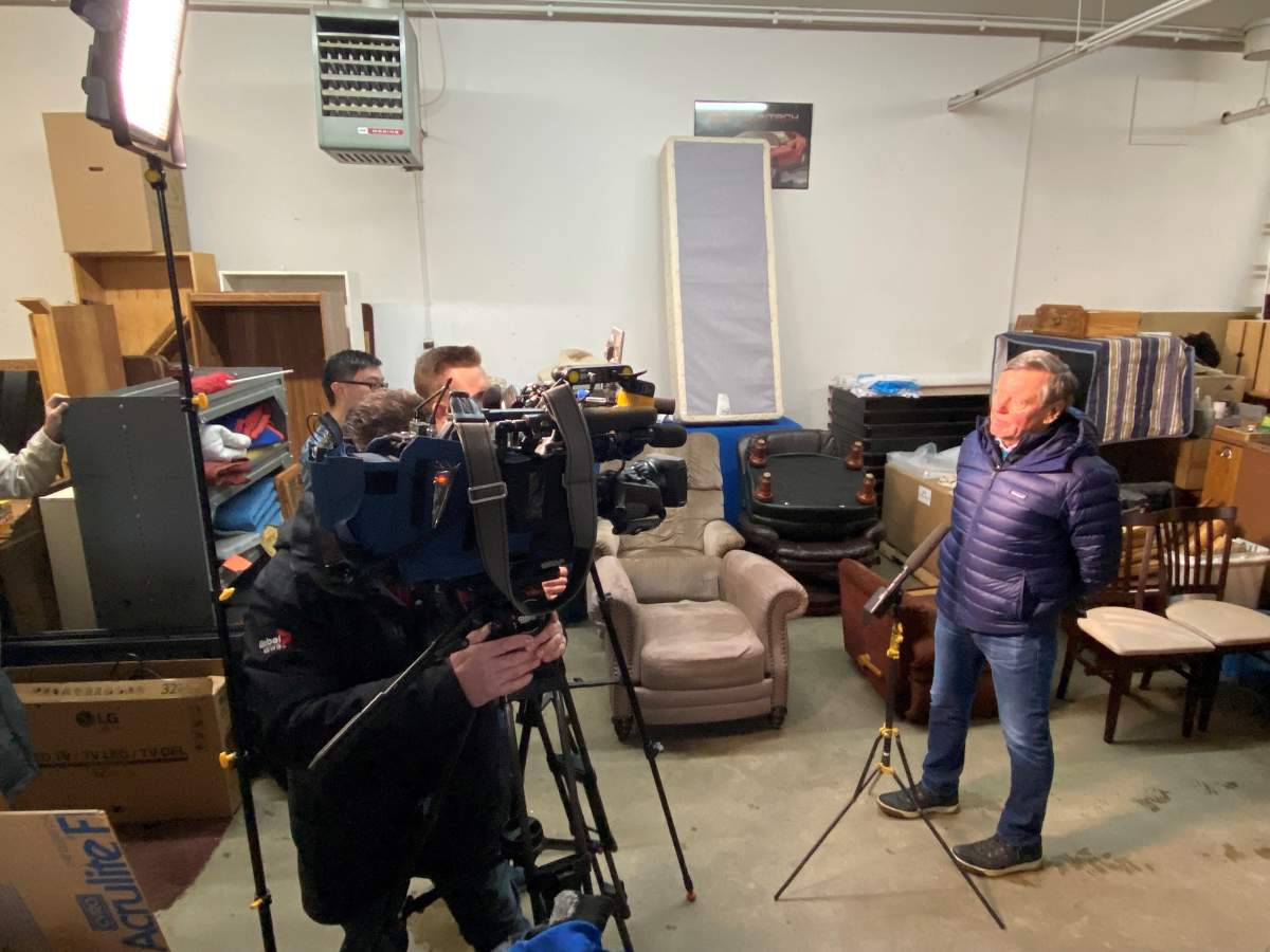 Society of Saint Vincent de Paul president Randy Yatscoff speaks to media inside the charity's furniture warehouse in central Edmonton. All goods are donated by the public.