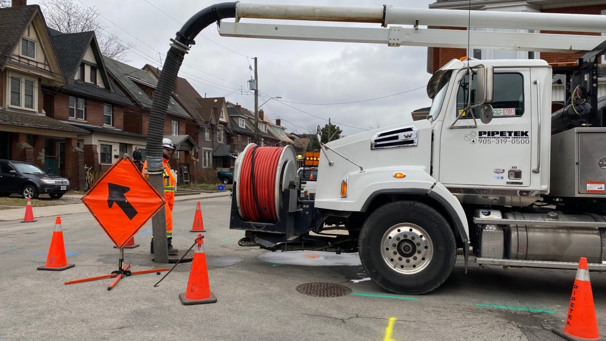 Work crews on scene at Rutherford & Myrtle Avenues in Hamilton fixing an improper sewer connection that's caused sewage to leak into Hamilton Harbour for the past 26 years.