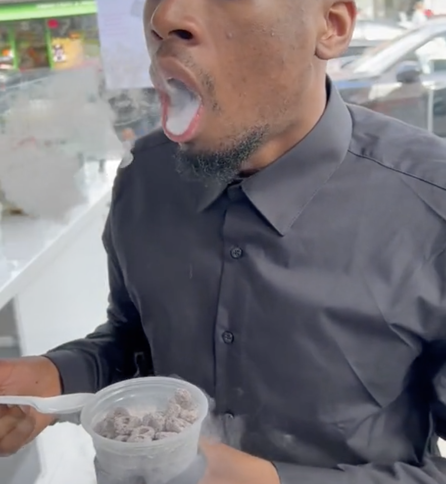 Screenshot of a viral TikTok showing a man eating "dragon's breath" candies.