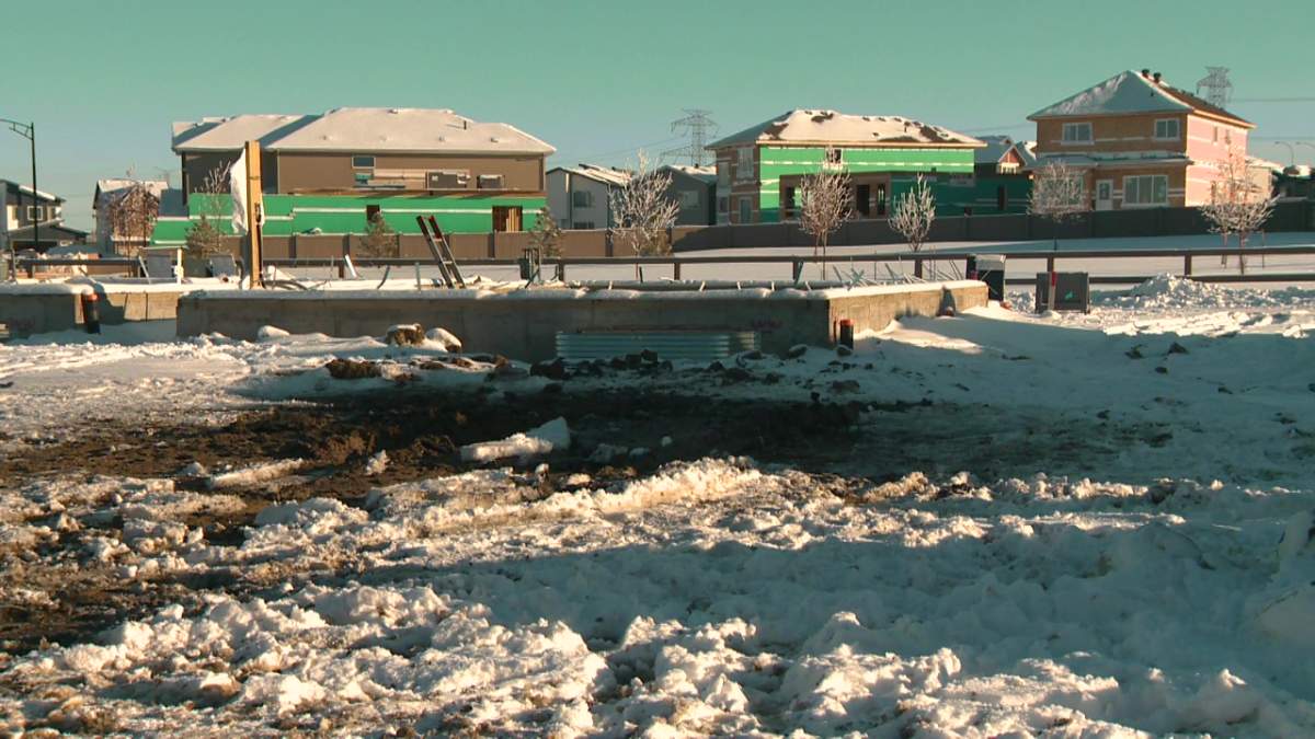 A lot where a burnt-out truck was found in southeast Edmonton's Laurel neighbourhood on Jan. 1, 2023.