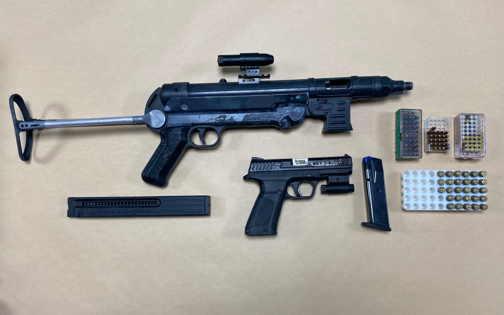 Police seized a number of guns at a suite in Victoria.