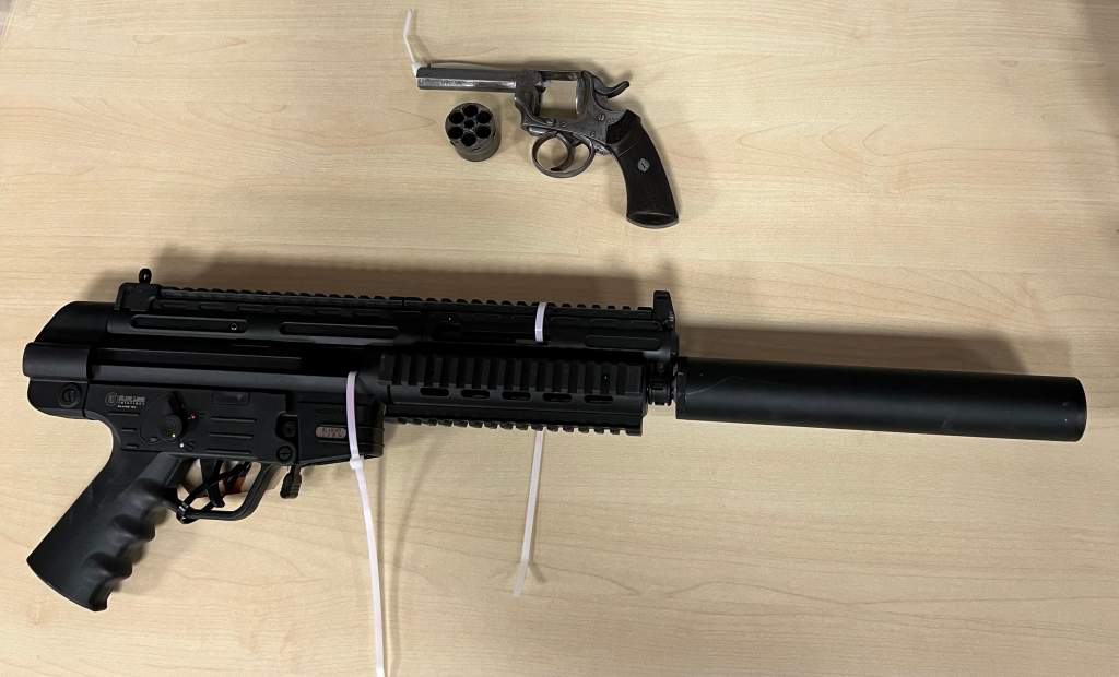 Guns, drugs, cash seized at temporary housing facility in 2 Victoria ...