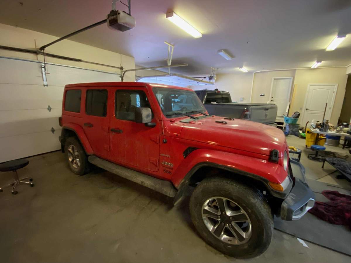 A Jeep by Calgary police as part of a monthlong investigation into drug trafficking and vehicle cloning.