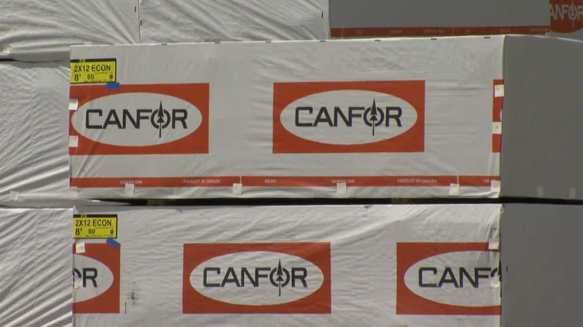 Canfor Corp. says it had a net loss of $350.1 million in its last quarter as it took write-downs and impairment charges in a slumping lumber market.