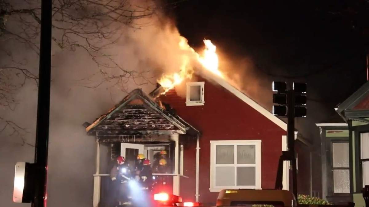 Vancouver firefighters seen battling the blaze, early Wednesday morning.