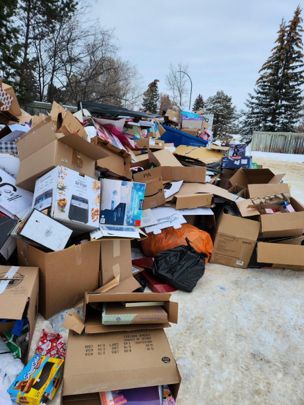 Boxes littered Saskatoon’s Lakewood recycling depot on New Year’s Day.