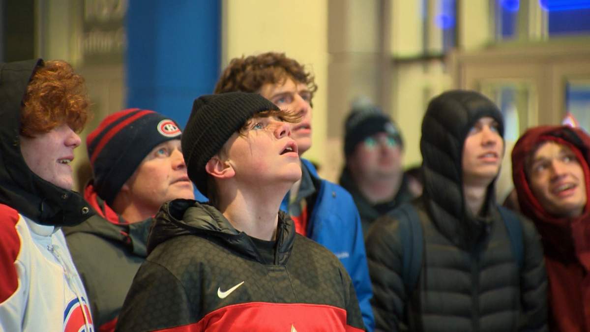 Fans watch with bated breath during the World Junior Hockey Championship final.