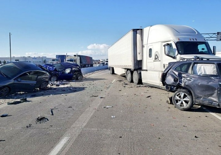Four-vehicle crash prompts closure of eastbound express lanes of Highway 401 at Hurontario Street on Jan. 31, 2023.