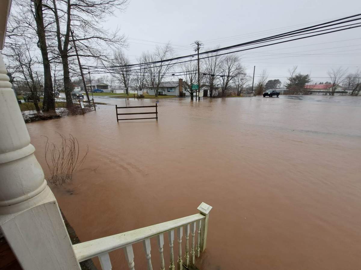 Mill Village Road flooded during heavy rainfall on Saturday January 14, 2023.