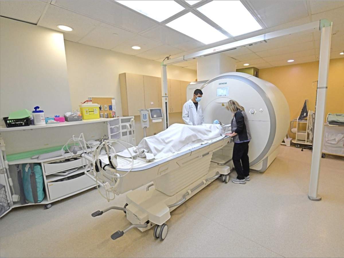 Dr. Raj Grover (left), RVH Medical Director of Medical Imaging, is seen in a magnetic resonance imaging (MRI) room, one of two currently in operation at RVH. The newly announced, third MRI is expected to be operational within 24 months.