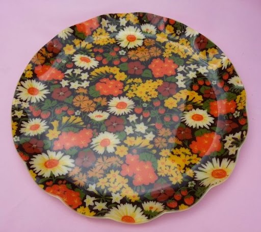 Fab Trays made by Hardy Glenwood Products, using designer fabrics sealed in a clear polyester composition.