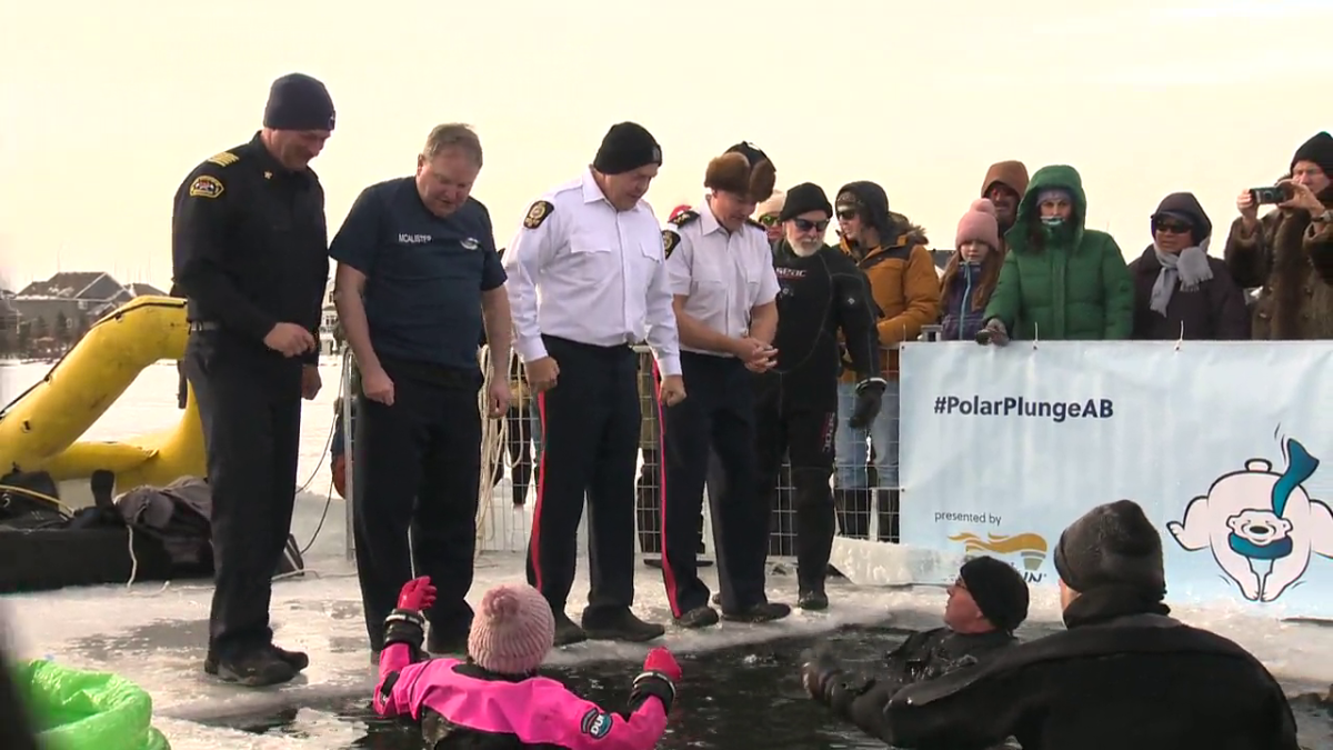 Officers get ready to take the plunge, Sunday, Jan. 29, 2023. 