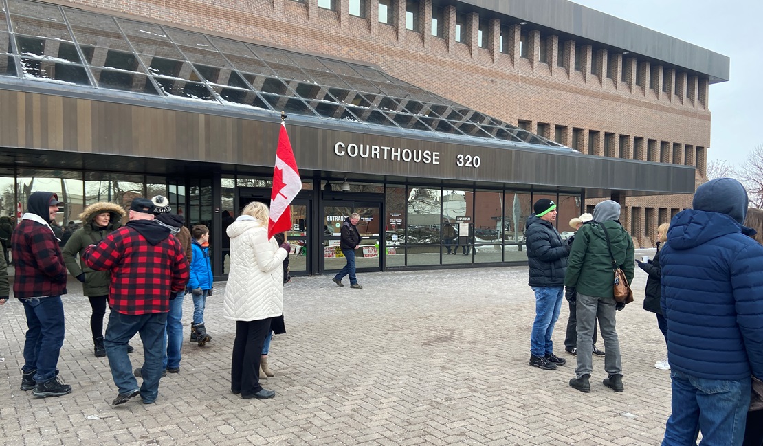 The trial for Artur Pawlowski began Thursday, Feb. 2, 2023, in southern Alberta on charges of breaching a release order and mischief for inciting people to block public property at the border crossing at Coutts, Alta.