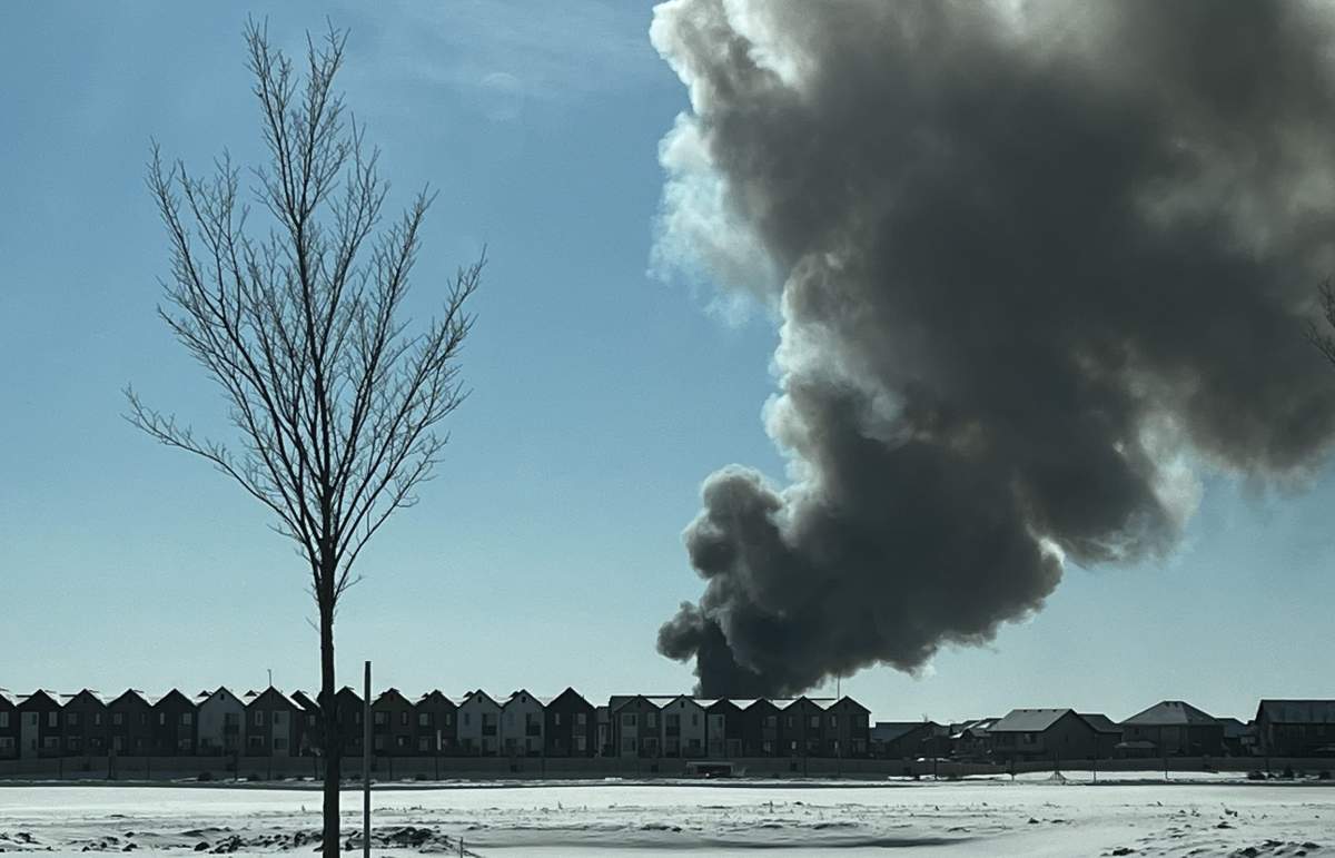 Smoke from a fire of a home under construction in Glennridding Ravine on Friday, Feb. 24, 2023.