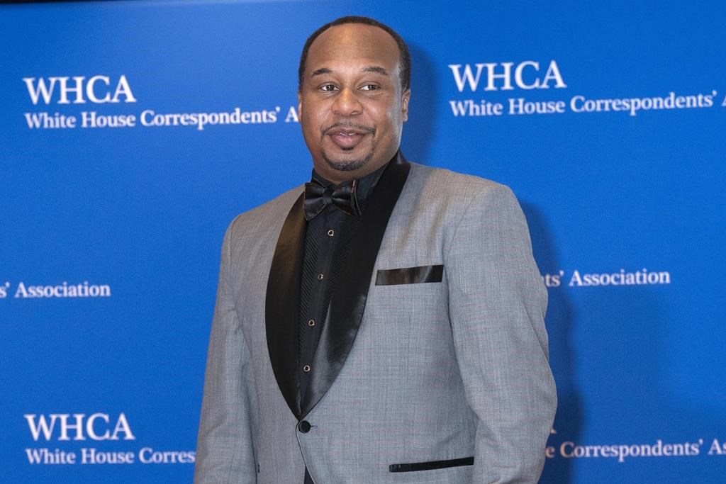 Comedian Roy Wood Jr. poses for photographers as he arrives to the annual White House Correspondents' Association Dinner, Saturday, April 30, 2022.