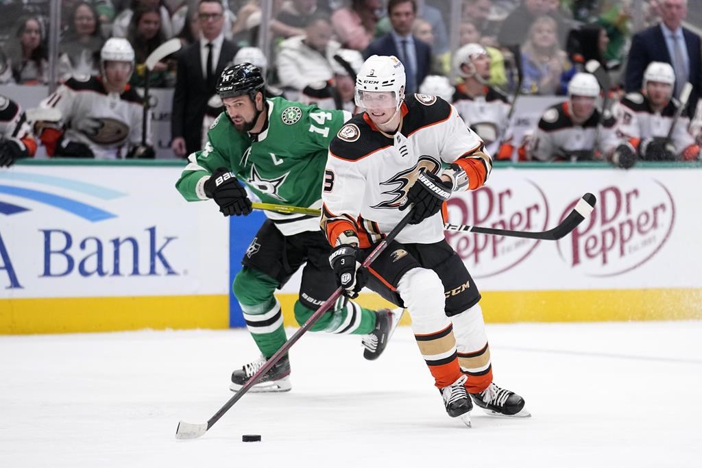 Anaheim Ducks defenceman John Klingberg (3) controls the puck as Dallas Stars left wing Jamie Benn (14) follows in the second period of an NHL hockey game, Monday, Feb. 6, 2023, in Dallas.