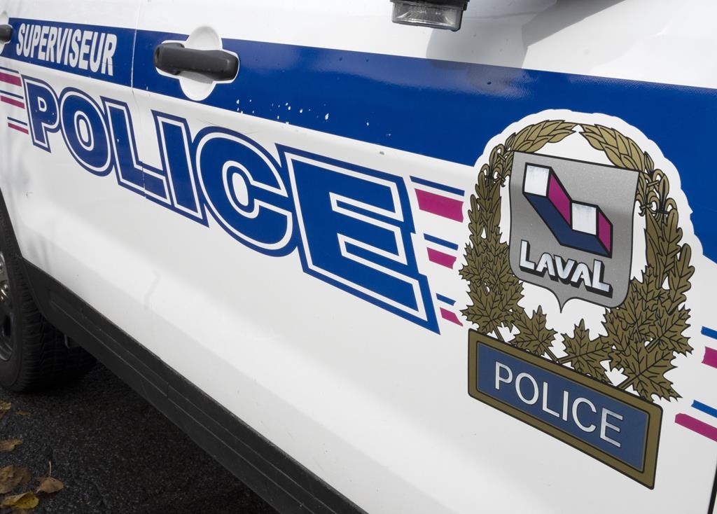 The Laval police logo is seen on a police car, Tuesday, Oct. 18, 2022, in Laval, Que. 