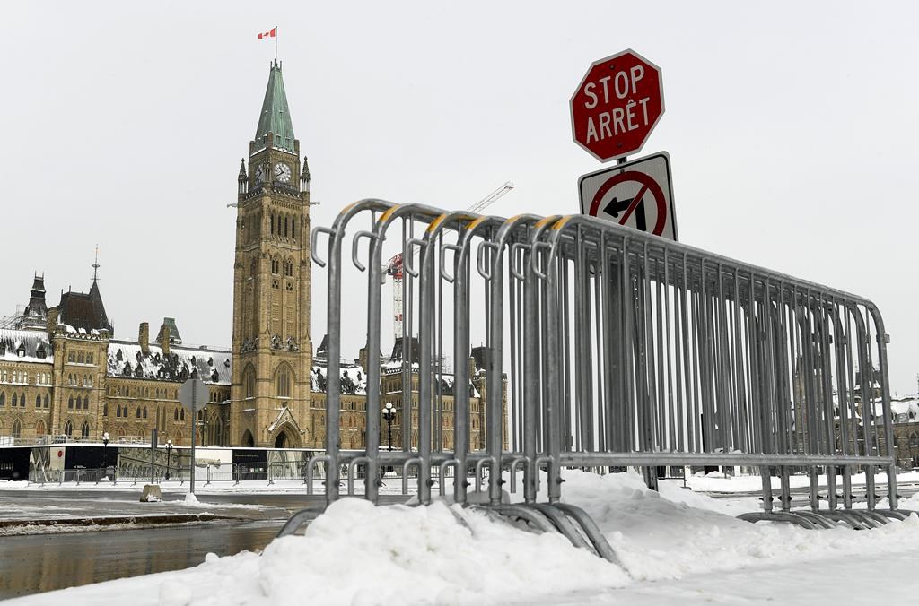 Ottawa city council has approved a motion to reopen Wellington Street to traffic over a year after it was closed off following the "Freedom Convoy." Fencing is seen on Parliament Hill in Ottawa, one year after the Freedom Convoy protests took place, on Friday, Jan. 27, 2023. 