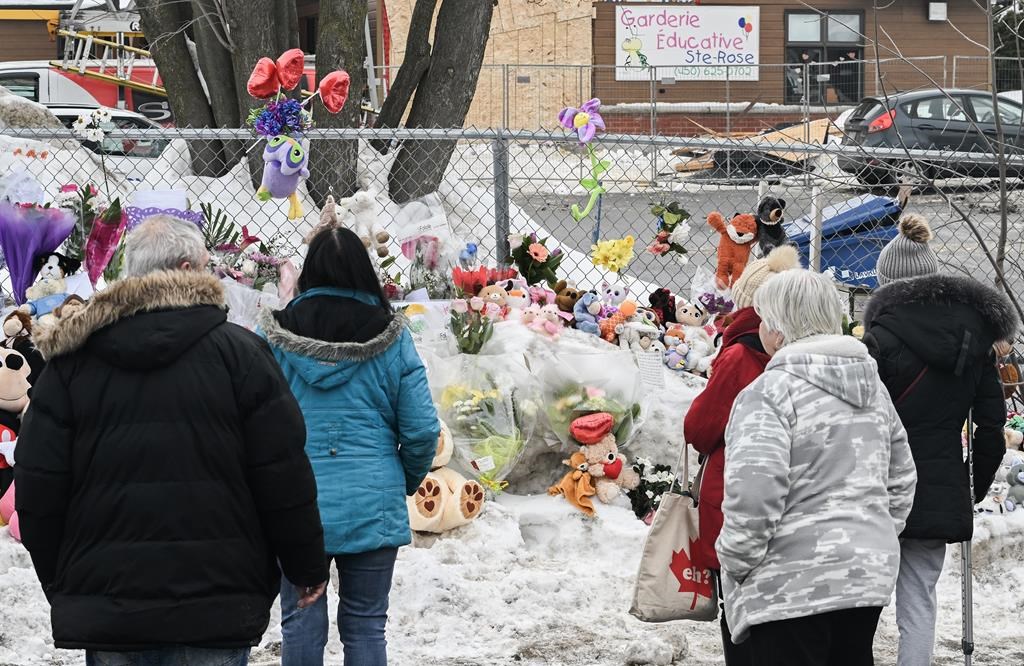 A memorial at the site of a daycare centre in Laval, Que