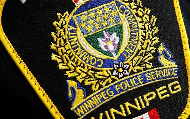 Photo of a Winnipeg Police Service shoulder badge on an officer in Winnipeg.