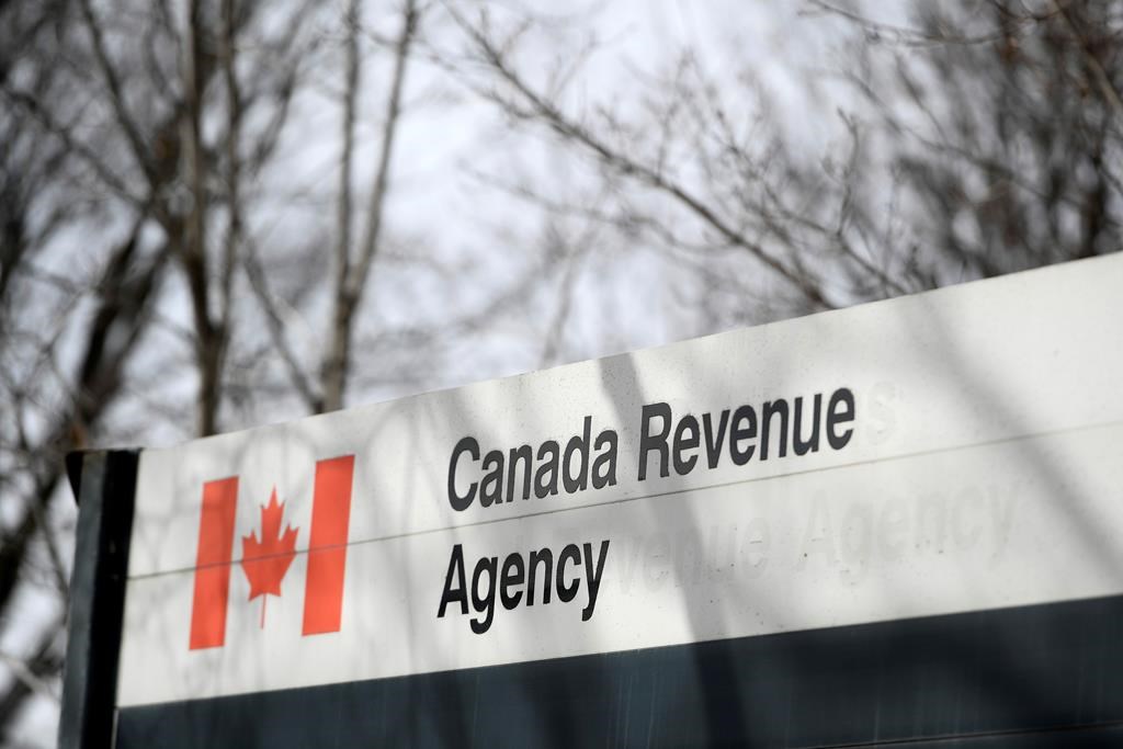 The Canada Revenue Agency sign outside the National Headquarters at the Connaught Building in Ottawa is seen on Monday, March 1, 2021.