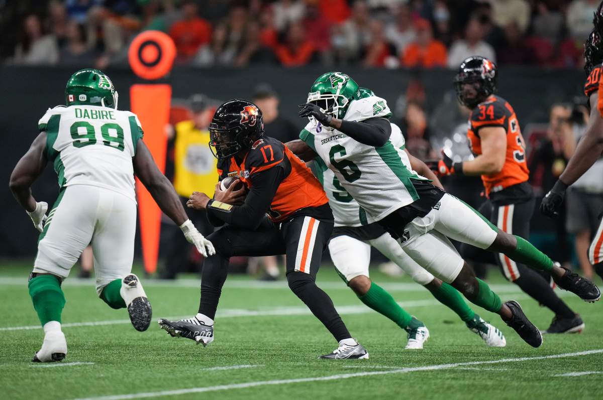 A.C. Leonard rushes Lions QB Antonio Pipkin.