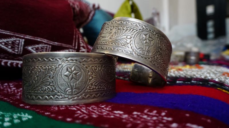 Solid silver antique Amazigh bracelets, estimated to be several hundred years old, are seen in Ben Talouba and Bousetta's Tunis home on Sat. Feb. 4, 2023. In addition to making Amazigh jewellery, Ben Talouba collects it.