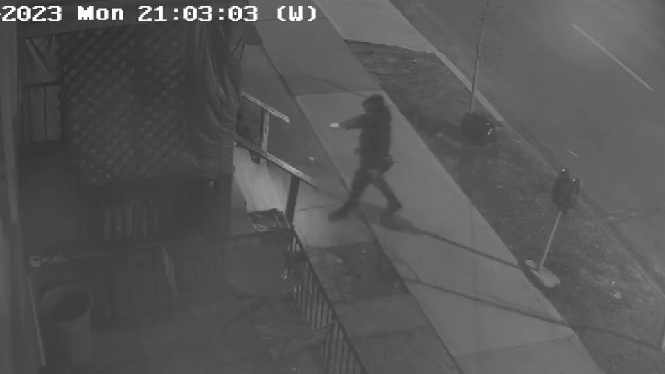 A photo from a security camera on Sanford Avenue north of Main Street East on Feb. 13, 2023 capturing an arson suspect Hamilton Police are seeking. 