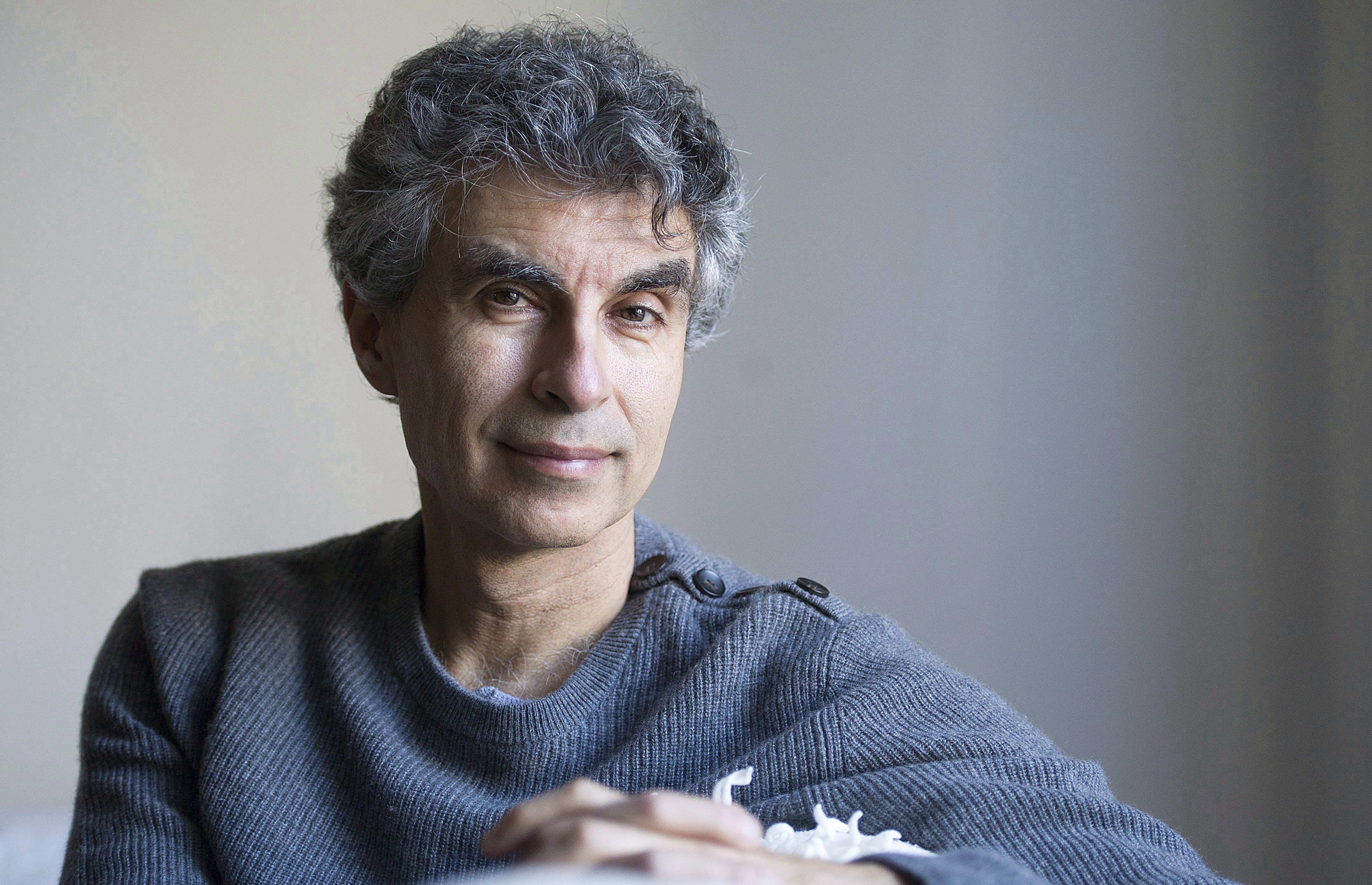 File - Computer Science professor Yoshua Bengio poses at his home in Montreal, Saturday, November 19, 2016.