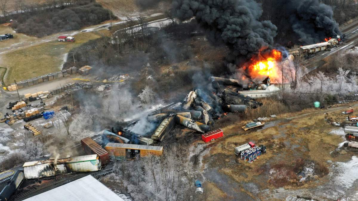 This photo taken with a drone shows portions of a Norfolk and Southern freight train that derailed Friday night in East Palestine, Ohio are still on fire at mid-day Saturday, Feb. 4, 2023.