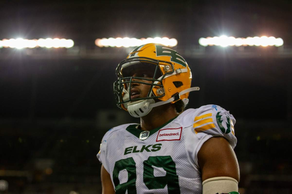Elks DL Christian Rector warms up at IG Field in Winnipeg.