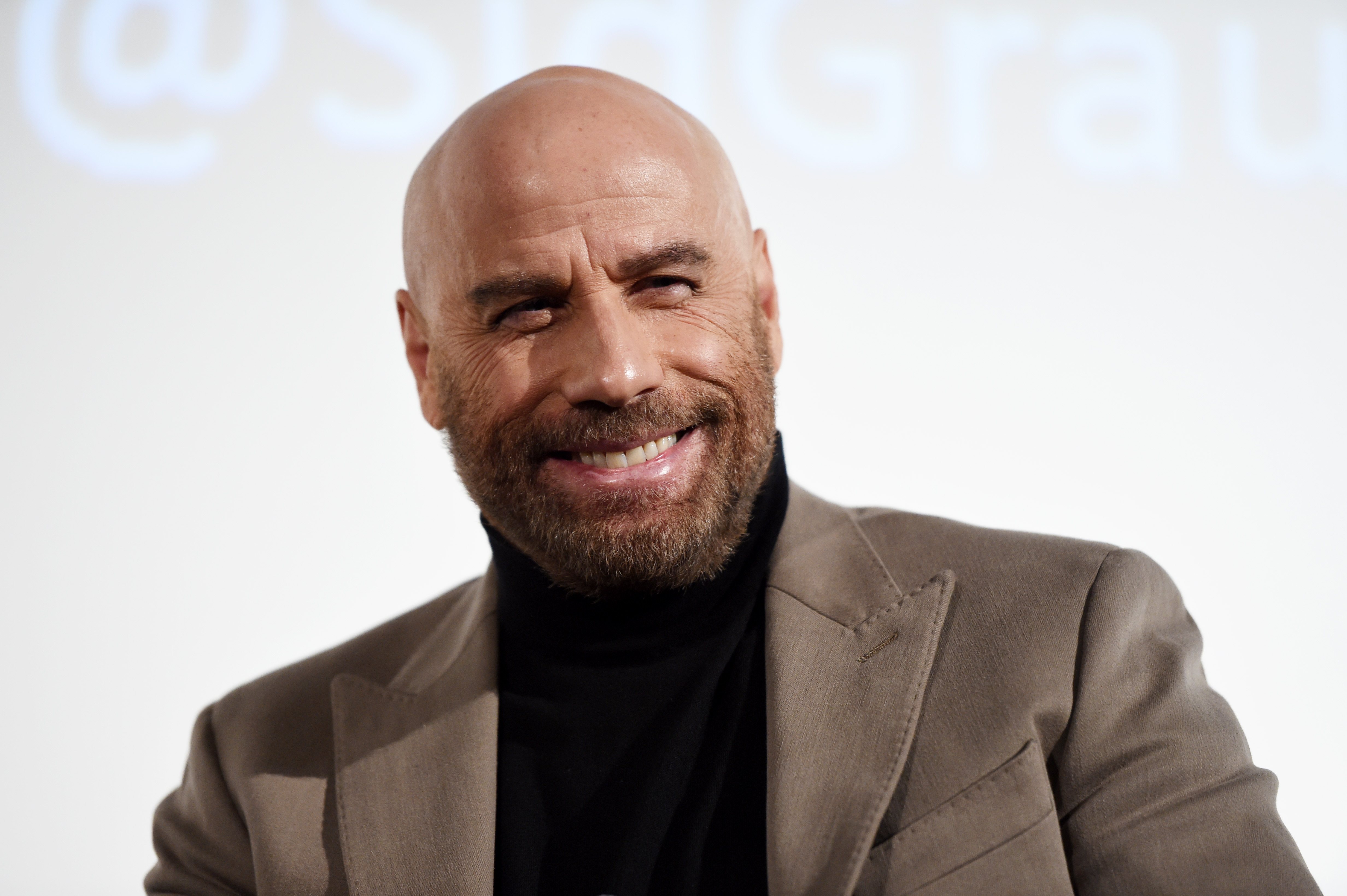 John Travolta Pays Tribute To Olivia Newton-John In Super Bowl Commercial 