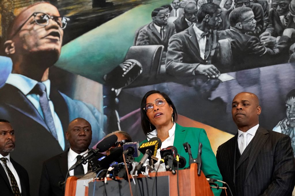 Ilyasah Shabazz (C), daughter of African-American activist Malcolm X, speaks alongside civil rights attorney Ben Crump (L) and co-counsel Ray Hamlin (R) during a press conference in New York on February 21, 2023.