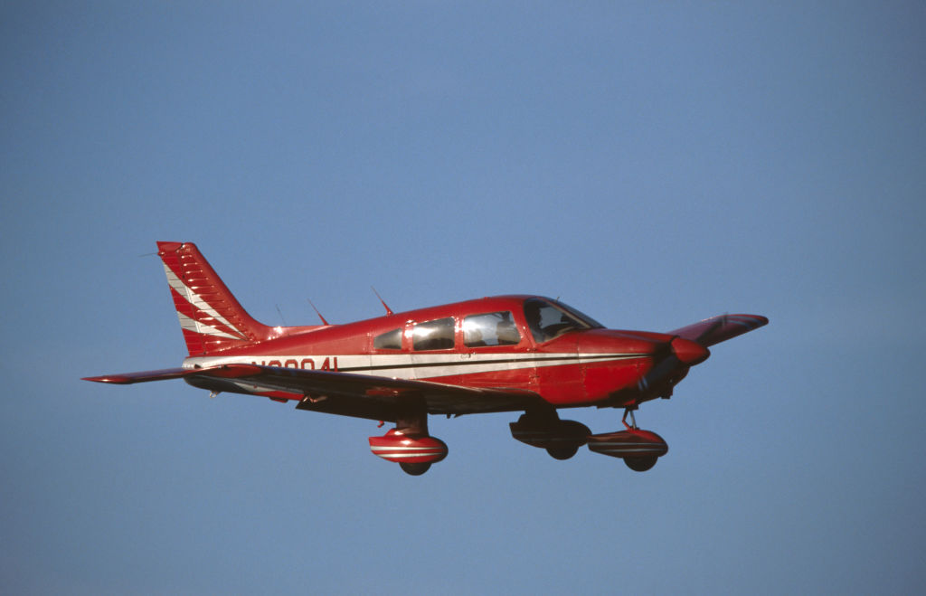 A red Piper PA-28 Cherokee flying enroute, similar to the plane involved in the Blackpool incident.