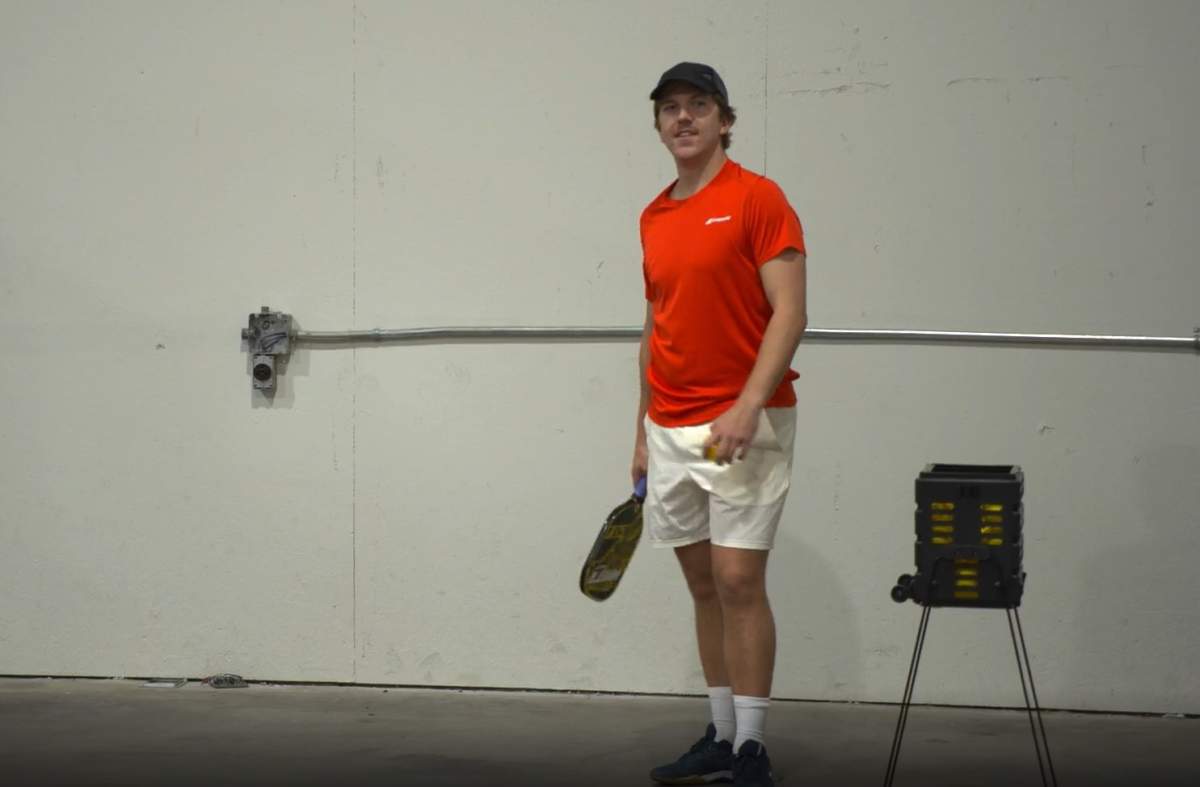 Haddow Thul works on his pickleball skills at a make-shift court built in a warehouse.