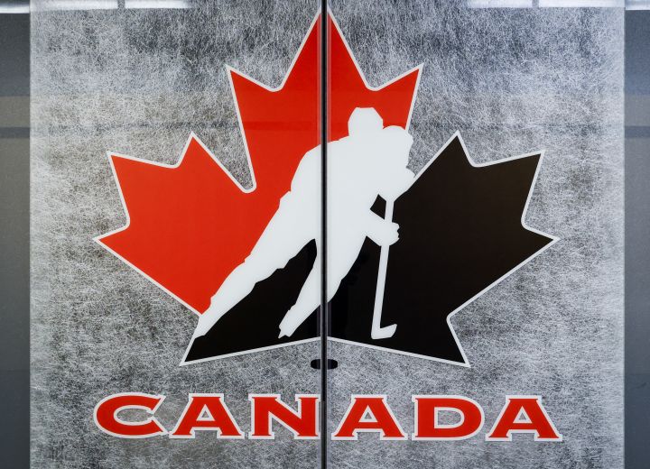 A Hockey Canada logo is seen on the door to a meeting room at the organizations head office in Calgary, Alta., Sunday, Nov. 6, 2022.