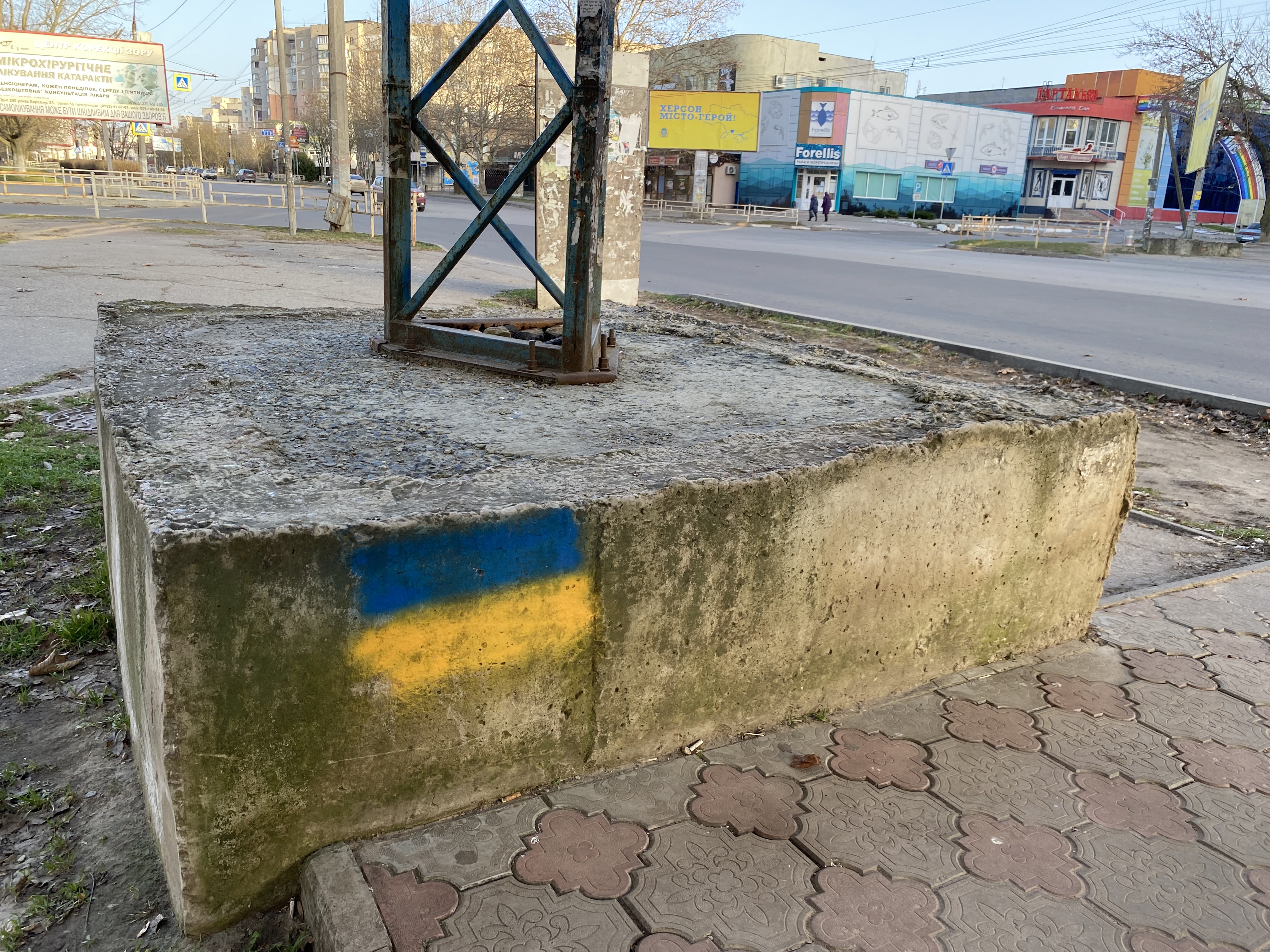 During the Russian occupation of Kherson, Liliia Aleksandrova snuck out at night to paint Ukrainian symbols, like this one at a bus stop.