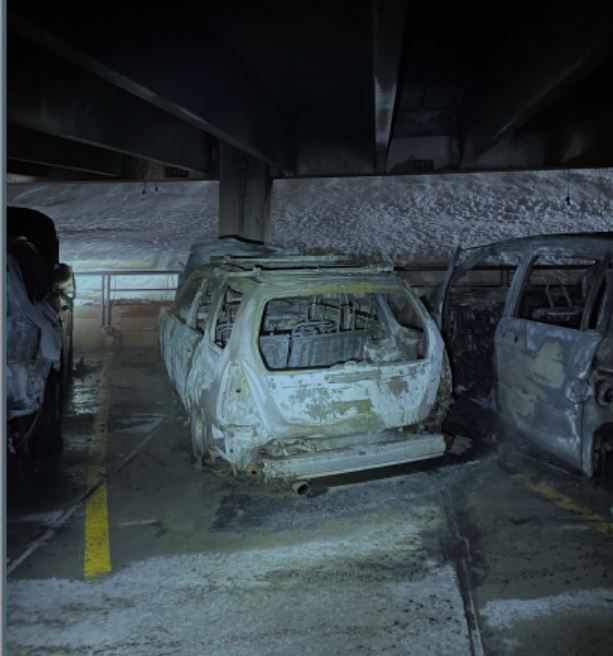 Remains of cars after a fire hit a parking garage at Fairmont Chateau Lake Louise on Feb. 8, 2023.