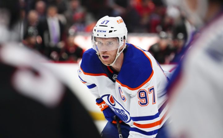 Edmonton Oilers centre Connor McDavid (97) faces off against the Ottawa Senators during first period NHL hockey action in Ottawa on Saturday, Feb. 11, 2023.
