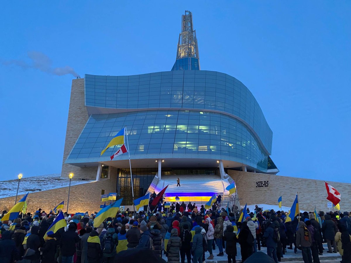 The crowd at a rally to support Ukraine outside the Canadian Museum for Human Rights Friday night.