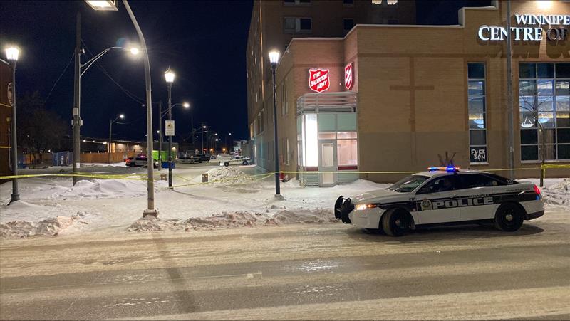 Winnipeg police outside the Salvation Army building on Main Street early Thursday morning.