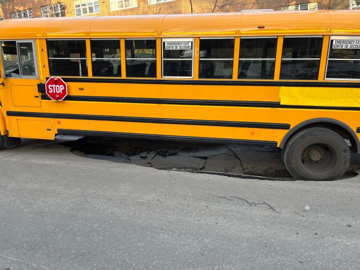 Firefighters investigating after large sinkhole found under school bus in Toronto