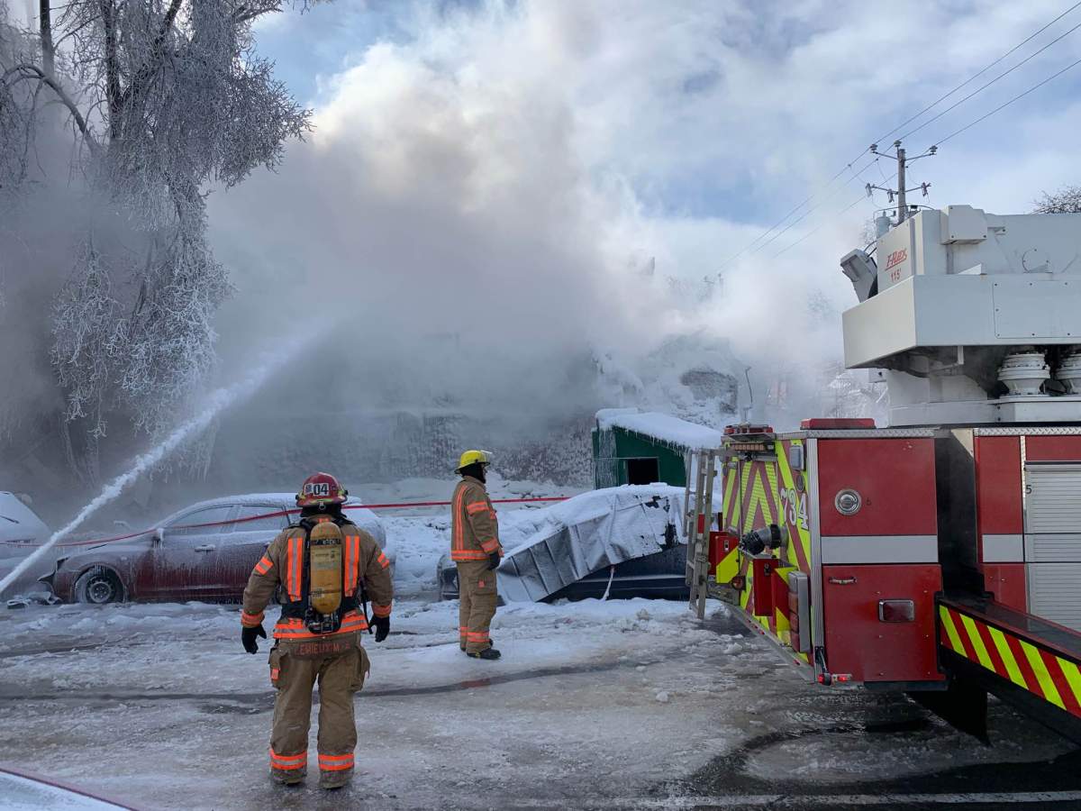 Montreal firefighters battle a five-alarm blaze as the city is under an extreme cold warning on Feb. 3, 2023.