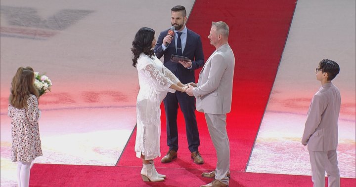 ‘Went to a hockey game and a wedding broke out’: couple ties the knot during Calgary Wranglers game