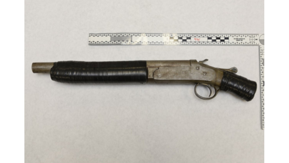 Police say a sawed-off shotgun was seized from a vehicle during a traffic stop in central Hamilton on Feb. 12, 2023.