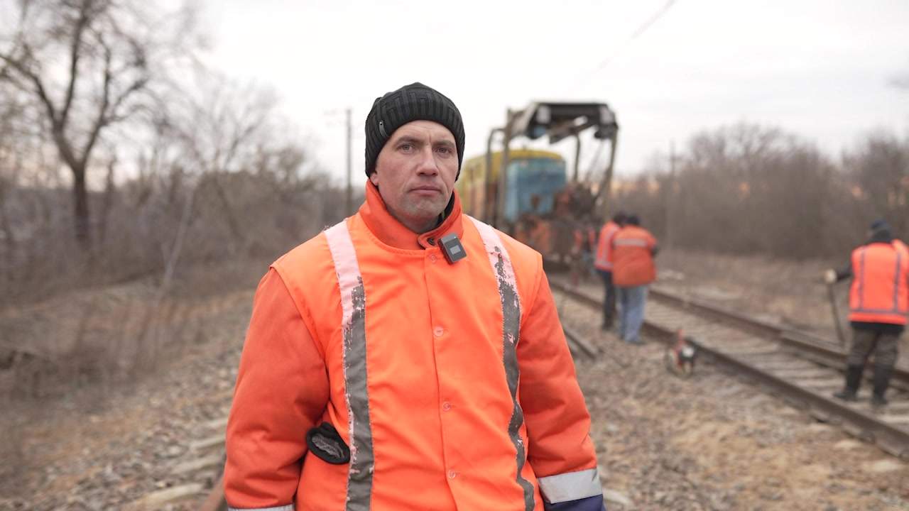 Serhii Lukhanin on the job, repairing damaged tracks near Prudyanka, Ukraine.