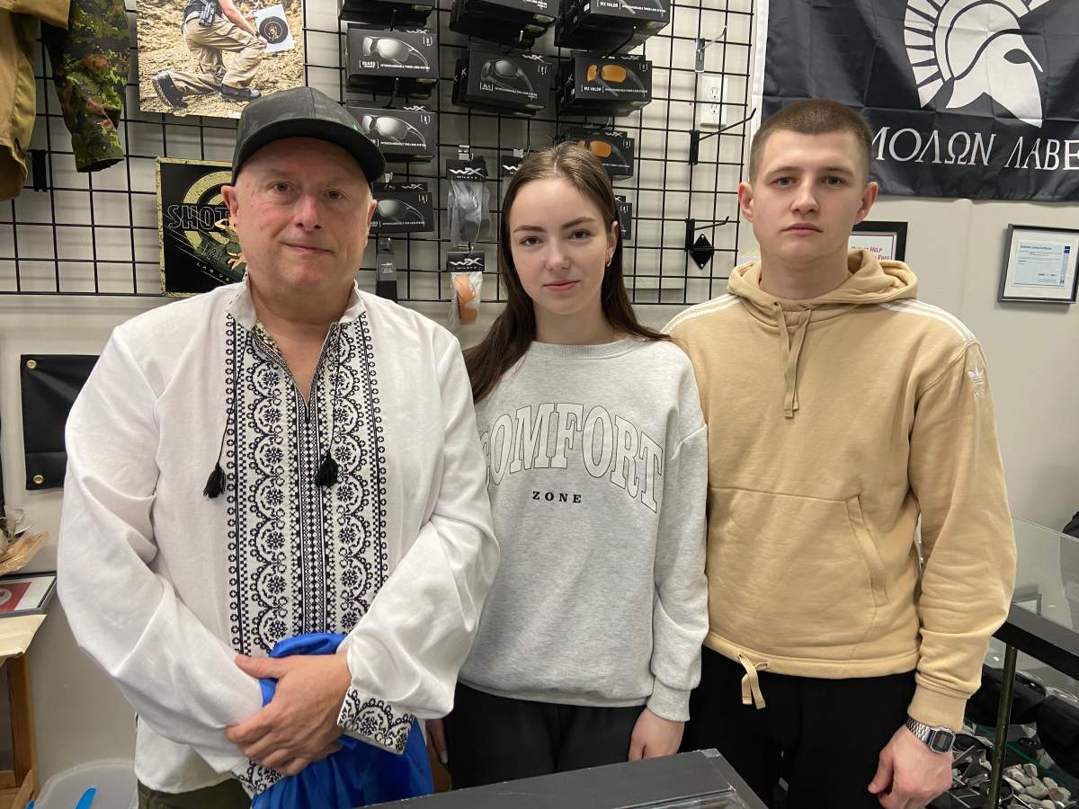 Dave Bryenton with Karyna Dyshkant and Artur Babych in Edmonton on Thursday, Feb. 23, 2023.